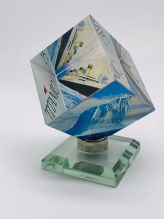 SPINNING CRYSTAL CUBE ON A STAND